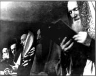 צילומים — קידוש החיים בגטו — מקור חזותי 1 מתוך 3, שאלת בגרות טוטליטריות ושואה
